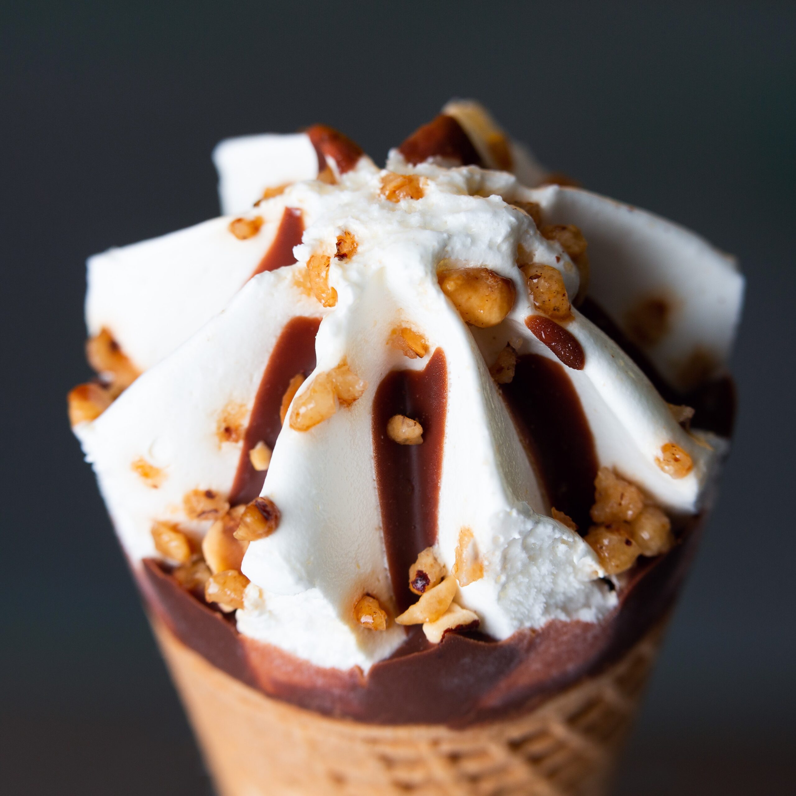 Cream and chocolate ice cream cone